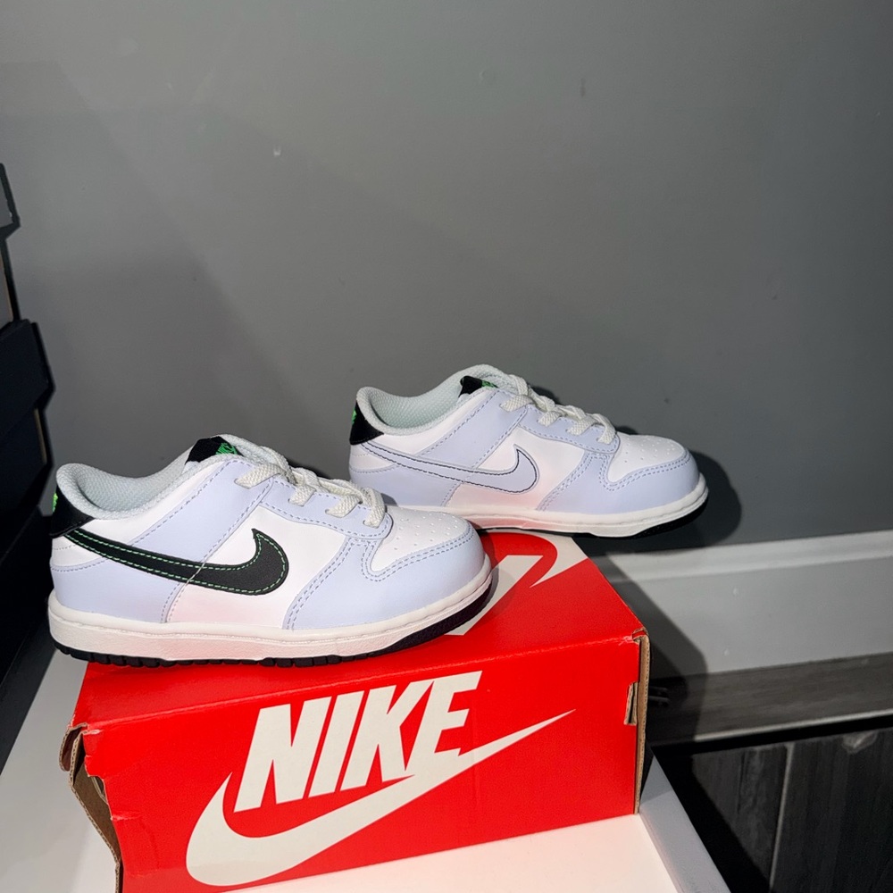 Nike Kids White Sneakers with Black Swoosh